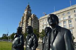 Beatles Statue with Royal Liver Building and Cunard Building in background